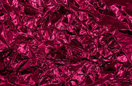 Abstract texture pattern metallic paper using as a background or wallpaper. Metal aluminum foil shiny and reflectorの写真素材