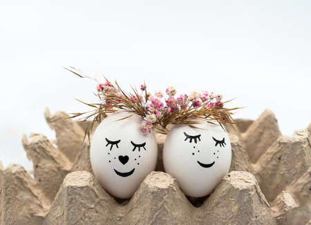 Easter eggs with happy faces. Close-up, isolated. Happy easterの写真素材