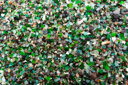 Glass Bay in Vladivostok. Sea-polished colored glass on the beach. Background, textureの写真素材