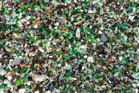 Glass Bay in Vladivostok. Sea-polished colored glass on the beach. Background, textureの写真素材