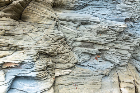 The rocks are colorful rock formations that have been deposited over hundreds of years. background and texture. high quality photoの写真素材