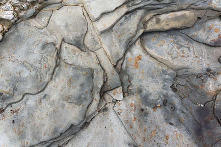The rocks are colorful rock formations that have been deposited over hundreds of years. background and texture. high quality photoの写真素材