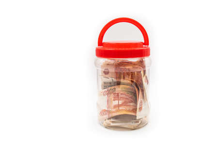 Glass jar with Russian money. Save or hide money in the bank. high quality photoの写真素材