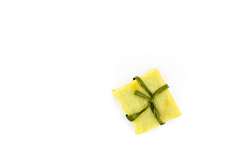 Natural handmade soap bars on wooden background. Spa organic soap in eco paper packaging. high quality photoの写真素材