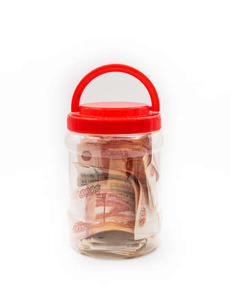 Glass jar with Russian money. Save or hide money in the bank. high quality photoの写真素材