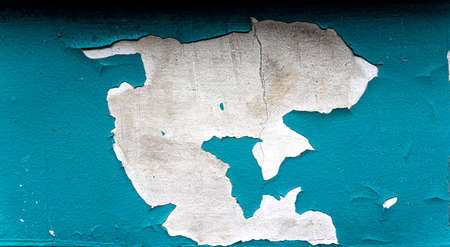 Peeling paint on the wall. Panorama of a concrete wall with old cracked peeling paint. high quality photoの写真素材