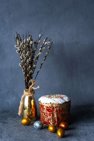 Happy Easter bread. Festive cake with traditional decor. Eggs, willow, trendy hard light, dark...