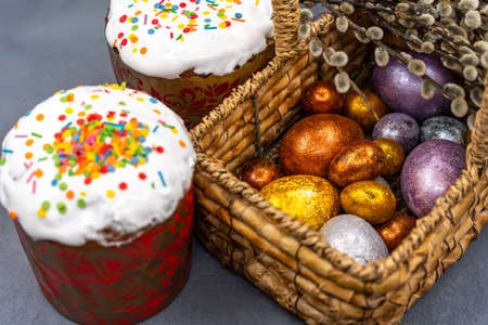 Happy Easter bread. Festive cake with traditional decor. Eggs, willow, trendy hard light, dark shadow.High quality photoの写真素材