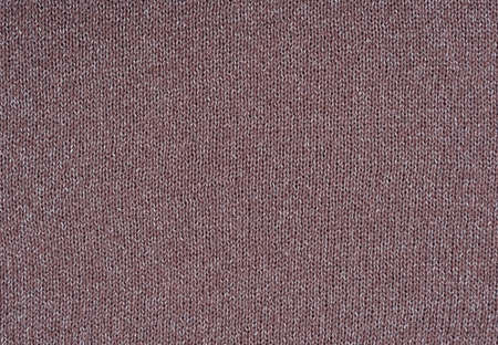 Pink soft knitted pattern close up as backgroundの写真素材