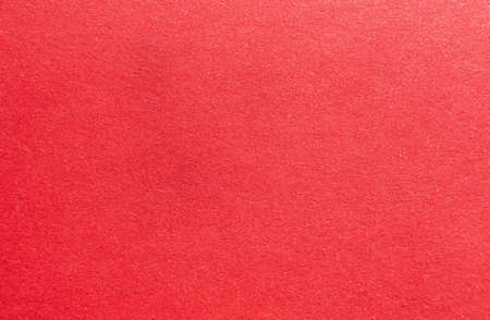 abstract red background or christmas paper with fine glitter. high quality photoの写真素材