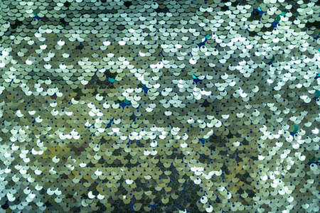 Colorful sequins sparkling background. Texture of sequins. high quality photoの写真素材