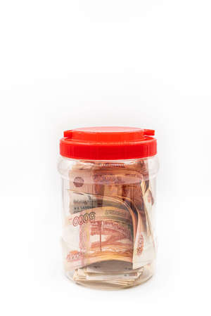 Glass jar with Russian money. Save or hide money in the bank. high quality photoの写真素材
