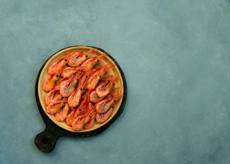 The shrimps are on the white plate. high quality photoの写真素材