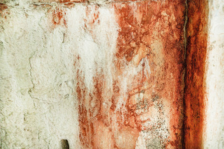 texture of old concrete dyed orange paint. cracks and streaks. text box. background for lettering. background for calligraphy.の写真素材
