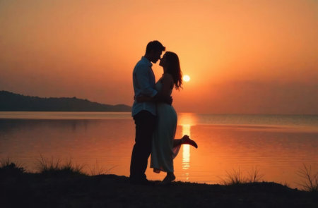couple in love, guy and girl stand at sunset sea, love concept, valentines dayの素材