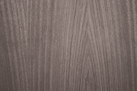 Decorative background in shades of grey with patterns simulating wood.