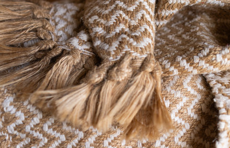 Decorative background of rustic fabric in beige tones . Wallpaper for textile products. Space for...