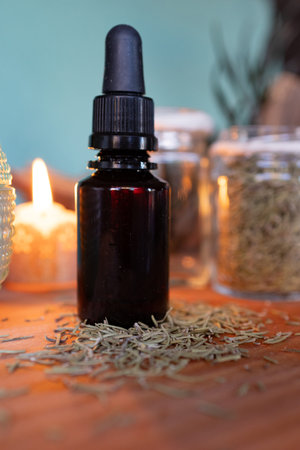 Alternative herbal medicine concept. Floral extracts and oils on a wooden table. Pure natural ingredients for the production of cosmetics. Aromatherapy .Real pecture.Copy spaceの写真素材