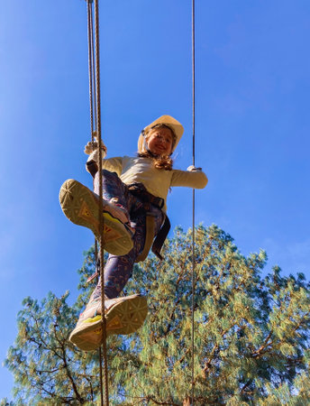 Active leisure time with children concept.Agility skills and climbing outdoor fun centre for...