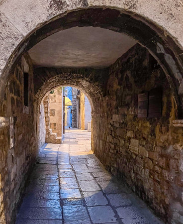 Passages in the middle of the historical streets of the Diocletian Palace. City declared World Heritage Site. Tourist sites full of history. Images for travel and tourism agenciesの写真素材