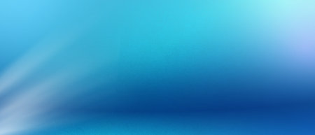 Soft gradient blue light effect, Background with blue light ,leak overlay effect with bokeh blur and light leaks. Wide horizontal shot.Grainy texture.の写真素材