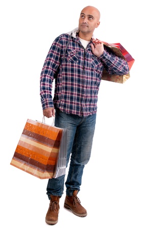 Adult man shopping christmas gifts isolated in whiteの写真素材