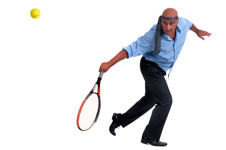business man playing tennisの写真素材
