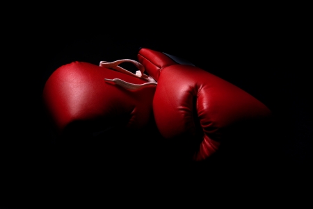 boxing gloves isolated in blackの写真素材