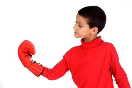 little boy with boxing gloves isolated in white