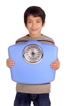 little boy holding a scaleの写真素材