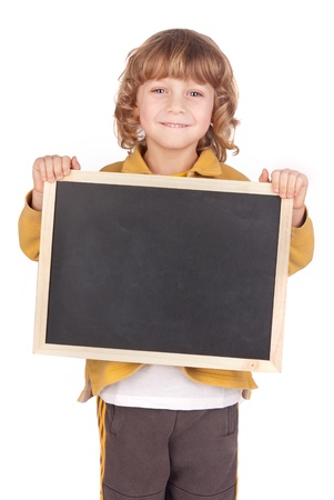 little boy holding a blackboardの写真素材