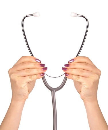 hands holding stetoscope on white backgroundの写真素材