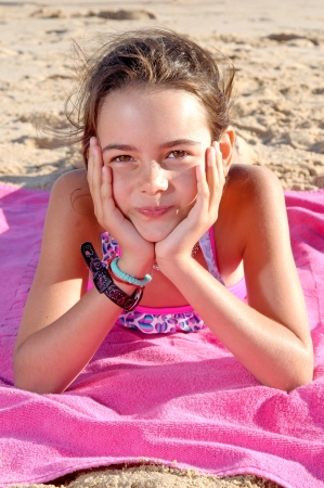 little girl on the beachの写真素材