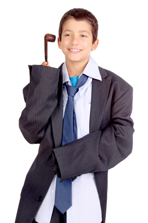 little boy isolated in white pretending to be an adultの写真素材