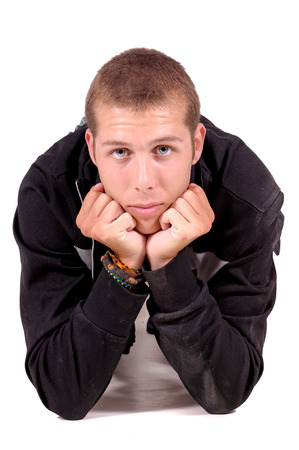 young man isolated in whiteの写真素材