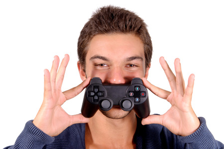teenage boy holding console controller