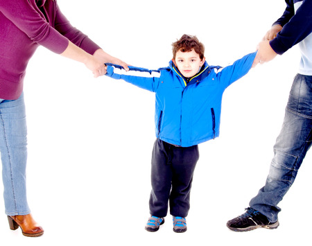 parents fighting over child isolated in whiteの写真素材