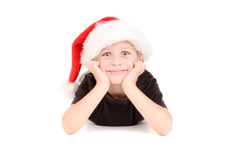 little boy with christmas hat isolated in white background little boy with christmas hat isolated in white background