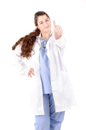 young female doctor isolated in white backgroundの写真素材