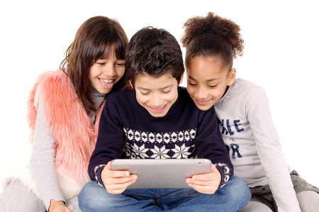 friends playing with tablet isolated in white background