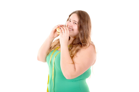 large girl in fitness outfit isolated in white backgroundの写真素材