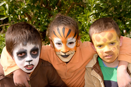little kids with face painted