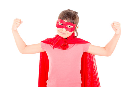 little girl pretending to be a superheroの写真素材