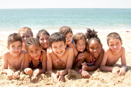 little kids at the beachの写真素材