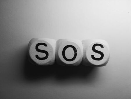 word sos on diceの写真素材
