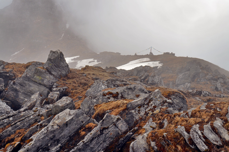 Foggy Rocky Mountain Landscape in Himalaya. Rocks and wet grass. Nepal, Annapurna region, Mardi Himal track.の写真素材