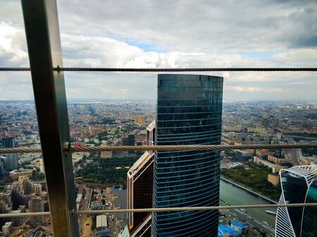 Moscow business center, top view of the city. Perspective. Skyscrapers with glass windows. Russia....