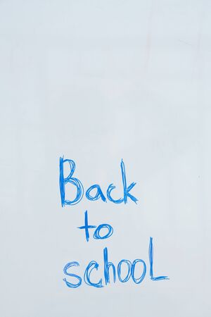 inscription on the board back to school. school startの写真素材