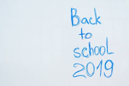 inscription on the board back to school. school startの写真素材