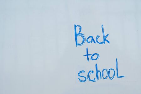 inscription on the board back to school. school startの写真素材